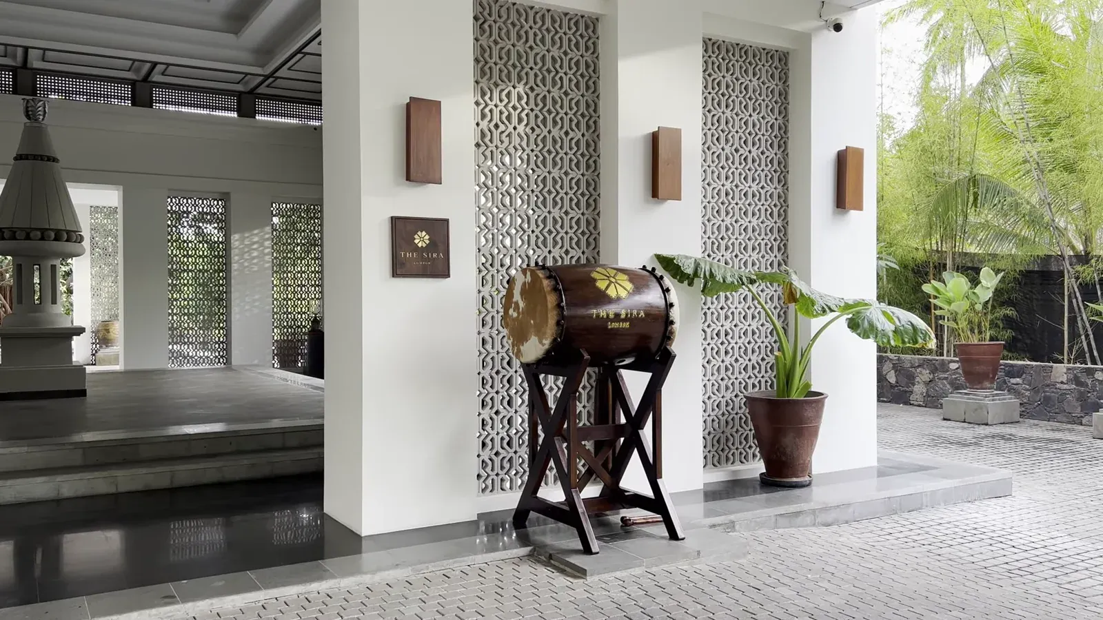 The bedug, a traditional Indonesian leather drum, on its stand at the entrance to The Sira Lombok