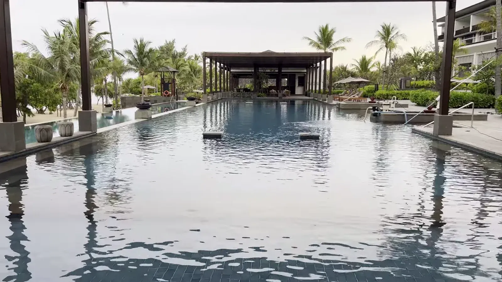 The main pool at The Sira Lombok, said to be the longest on the island, looking towards the sea