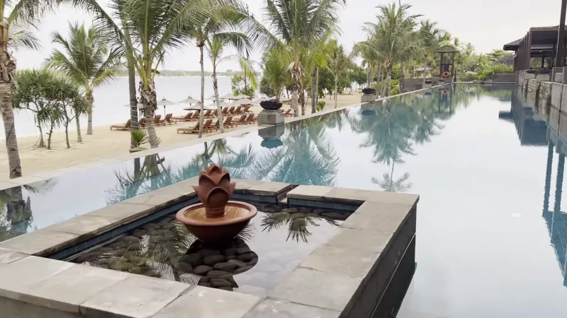 The pool at dusk, looking towards the sea
